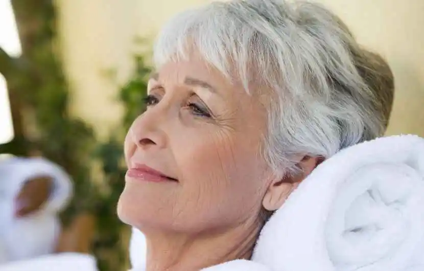 A senior woman enjoying her self-care time at a spa in Canada, a way Seniors Can Cope With Uncertainty During COVID-19 