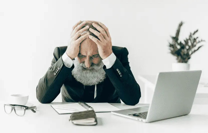 An elderly worker is upset after being fired