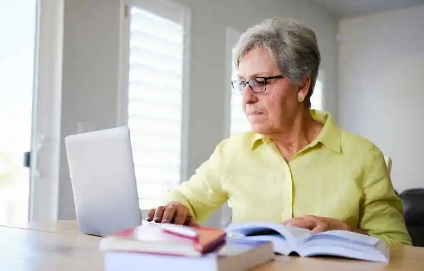 An older woman studying to start a new career.