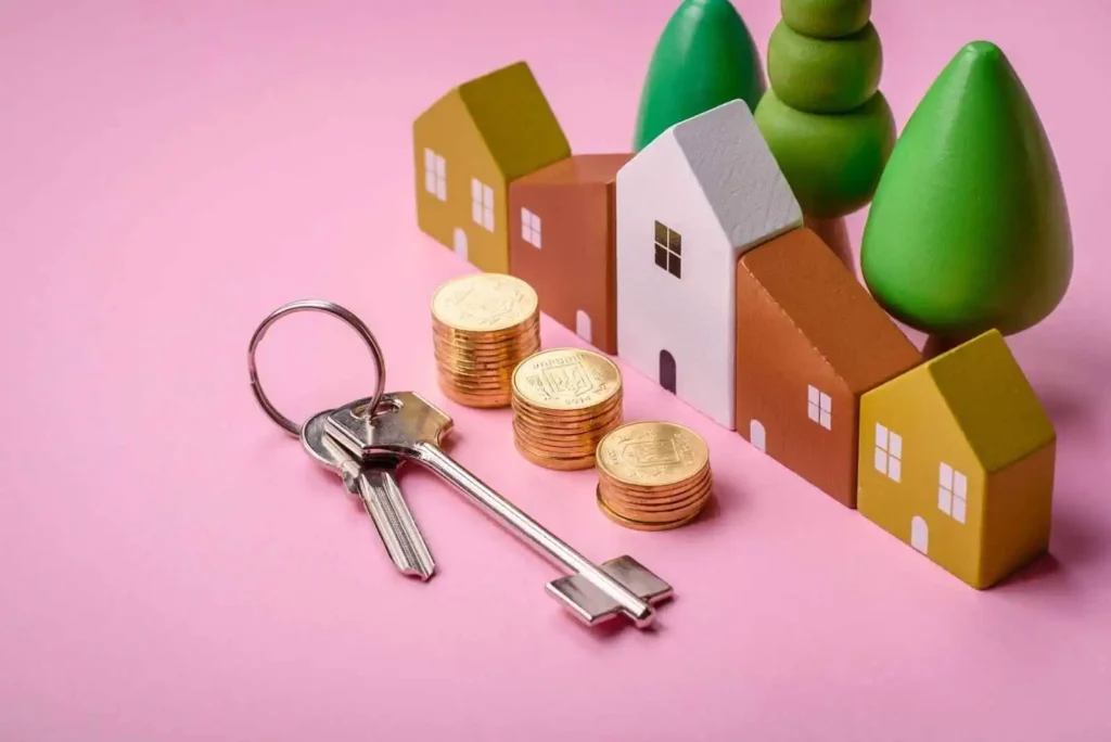 A small wooden house and keys